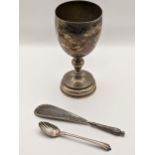 A silver trophy cup engraved, on 18th/19th century shell bowl spoon and a shoe horn Location: