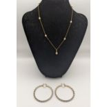 A 9ct gold a peal necklace together with 9ct gold hoop earring Location:
