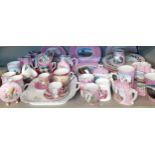 Early 20th Century German pink and white glazed china to include lustre and souvenir examples