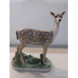 A Copenhagen model of a doe, numbered 465 to the base, 27cmHigh x 21cm Wide.