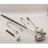 Silver to include 2 sugar tongs, a seal spoon 130g, a toddy ladle and a Scandinavian spoon.