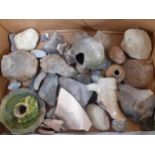 A mixed lot to include fossils and specimen stones, pottery finds and lamps, pottery, a French-