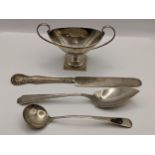 An early 20th century silver miniature trophy together with two sterling silver spoons sterling