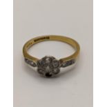 A 18ct gold and platinum daisy cluster diamond ring A/F, total weight, 2.4g Location: