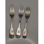 Three fiddle pattern shaped silver forks hallmarked Sheffield 1909, total weight 135.9g Location: