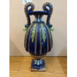 A 19th century Majolica twin handled vase on square base, 53cm high Location: