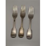 Three fiddle pattern shaped silver forks hallmarked Sheffield 1909, total weight 150.3g Location: