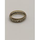 A gold coloured metal eternity ring tested as 9ct, 4g A/F Location: