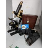 Circa 1900, an R Winkel Gotlinger microscope, together with a pair of leather cased Carl Zeiss