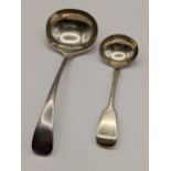 Two silver sauce ladles to include a Victorian fiddle pattern ladle hallmarked Exeter 1871, 87g