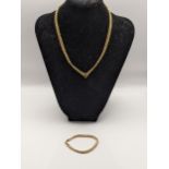 A boxed 9ct gold woven rope link necklace together with a matching bracelet, total weight, 9.6g