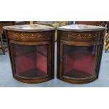 A pair of late Victorian rosewood bow fronted wall hanging corner cabinets, 56cm h x 50cm w