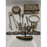 A collection of white metal and silver plate to include trinket boxes, bracelet, horn handled bottle