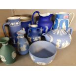 A quantity of Wedgwood and Wedgwood Jasperware style jugs, vases, a teapot and other items.