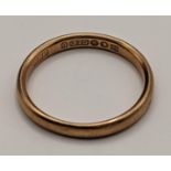 A 9ct gold wedding band, total weight 2.2g Location:
