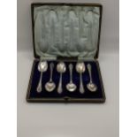 Six cased silver teaspoons hallmarked Sheffield 1901, total weight 67.9g Location: