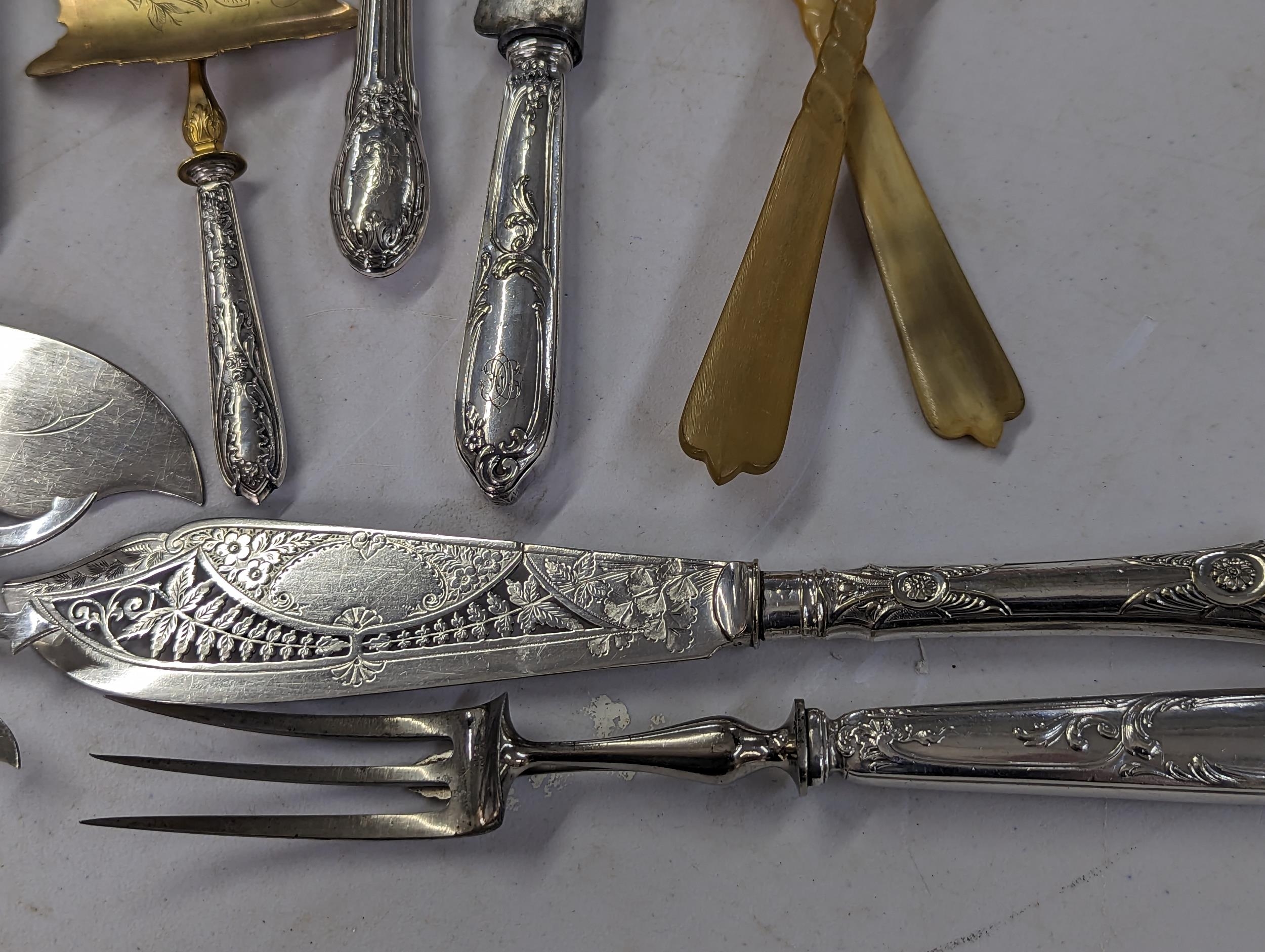 A group of mixed 19th century and later silver handled serving sets, to include French examples, - Image 3 of 8