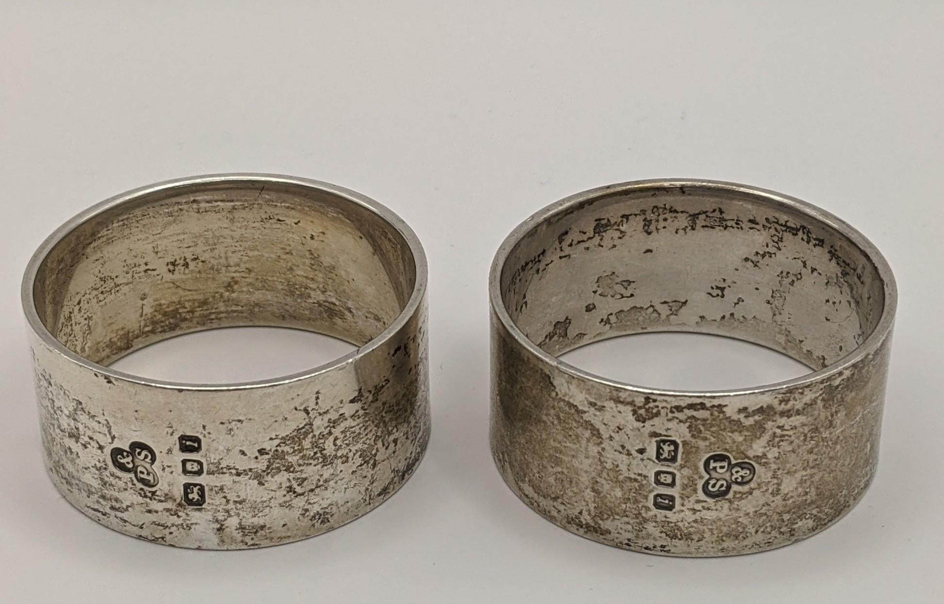 Two silver napkin rings hallmarked London 1964, together with a European folk container brooch - Image 2 of 4