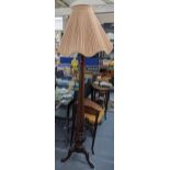 A Victorian mahogany 'bed post' standard lamp having a bulbous support on 3 splayed legs, 164cmH