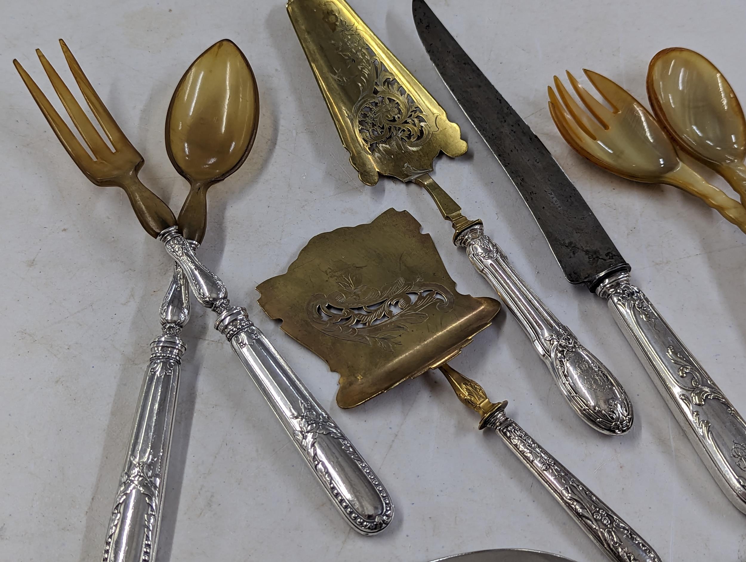 A group of mixed 19th century and later silver handled serving sets, to include French examples, - Image 5 of 8