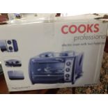A boxed Cooks Professional electric oven. Location:RAF