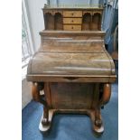 A Victorian burr walnut piano davenport, with pop up stationery holder with pigeon holes, birds
