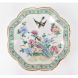 A Chinese Tongzhi porcelain pedestal dish, circa 1862-1874, with petal gilt border, the centre