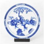 A Chinese Qing dynasty blue and white charger, in the Kangxi style but 19th century, with central