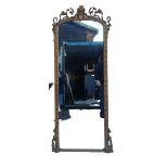 A 19th century giltwood mirror, with single plate framed within an acanthus border and scrolled