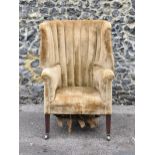 A George III barrel back armchair, upholstered in brown velvet fabric, on tapering mahogany square