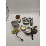 A mixed lot to include a Dunlop lighter and others, together with a silver plated vesta case along