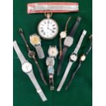 A group of wristwatches to include Timex together with a nickel plated Goliath 8-day pocket watch