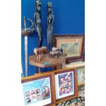 A mixed lot to include a small octagonal occasional table, African treen ornaments, mixed prints,