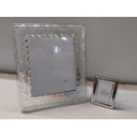 A large Waterford Marquise photograph frame together with a small silver photograph frame Location: