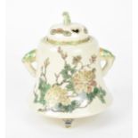 A Japanese late Meiji period koro or hibachi, of bell shape with painted detailed peonies