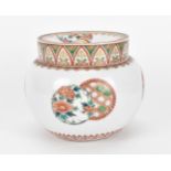 A Japanese Kutani decorated porcelain lidded jar, Meiji period, of globular form with white body