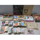 A mixed lot to include cigarette cards loose and in albums, souvenir coronation programme, Anglo