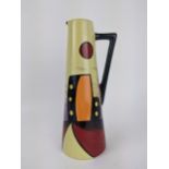 A Lorna Bailey Manhattan pattern jug decorated with a sky line in orange, black, red, yellow and