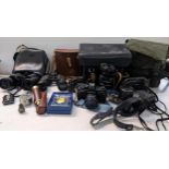 Mixed cameras, binoculars and accessories to include Praktica, Tasco, U.S.1 and others together with