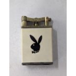 A vintage Playboy table lighter having emblem to both sides Location: