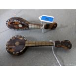 Two Continental inlaid tortoiseshell and mother of pearl model banjo/ukulele musical instruments