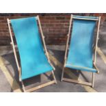 A pair of vintage deck chairs with green fabric seats Location: LWB