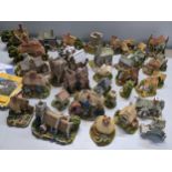 A collection of Lilliput Lane cottages to include Hampton Manor, The Chocolate House and others