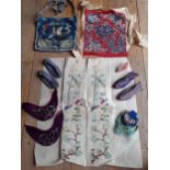 A group of 19th and 20th Century Chinese embroidered items to include a child's pair of red silk