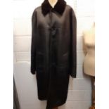 Cerutti 1881-A modern gents Italian black leather coat with black faux fur lining and collar, 42/44"