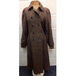 A 1970's Irish Jimmy Hourihan woollen ladies coat with bellow arms, 38" chest x 45" long, pleated at