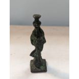 A green patinated bronze figure of a woman, 10cm high Location: