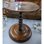 A Victorian mahogany circular dish topped occasional table having a barley twist column and circular