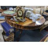 A South African hardwood pedestal table on a tripod base and a set of six matching chairs Location:
