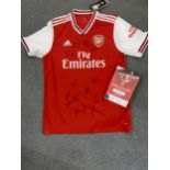 An official signed Arsenal football shirt Circa 2018, serial number AFC011839, with original tags,